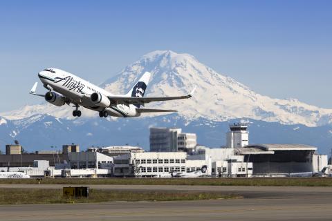 Alaska Airlines 737 taking off from Sea-Tac Airport with Mt Rainier and Central Terminal in background. Photo: Port of Seattle by Don Wilson Alaska Airlines 737 taking off from Sea-Tac Airport with Mt Rainier and Central Terminal in background. Photo: Port of Seattle by Don Wilson